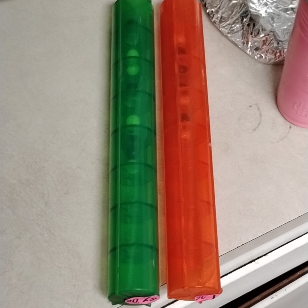 Colorful Green and Orange Puzzle Tubes